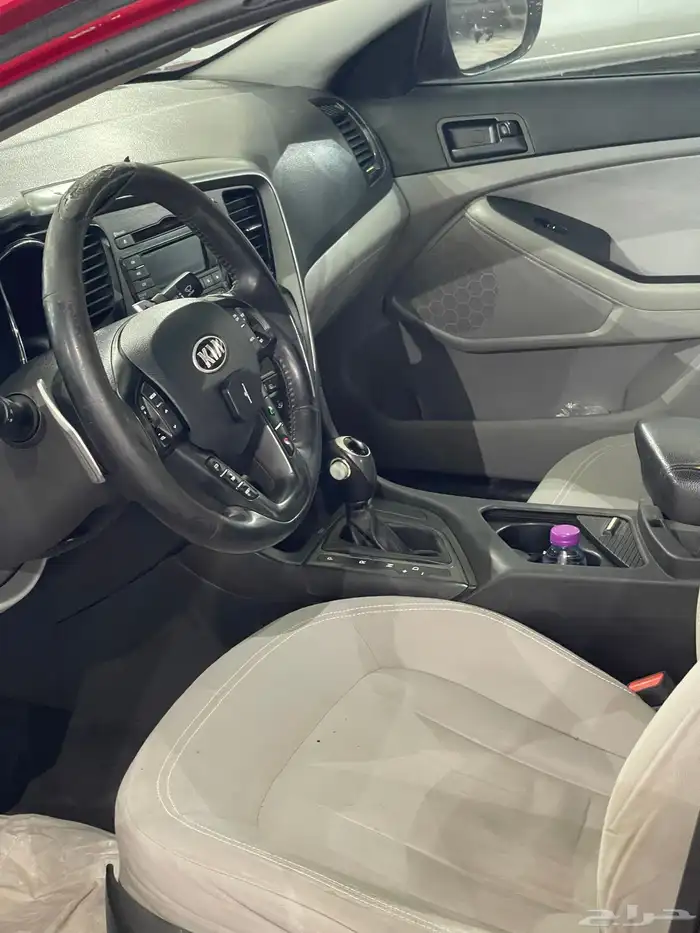 كيا أوبتيما موديل 2013 نص فل احمر دم غزال 9