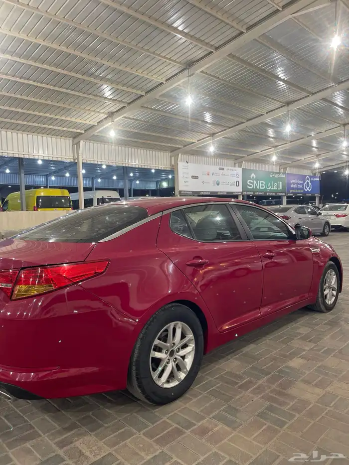 كيا أوبتيما موديل 2013 نص فل احمر دم غزال 4