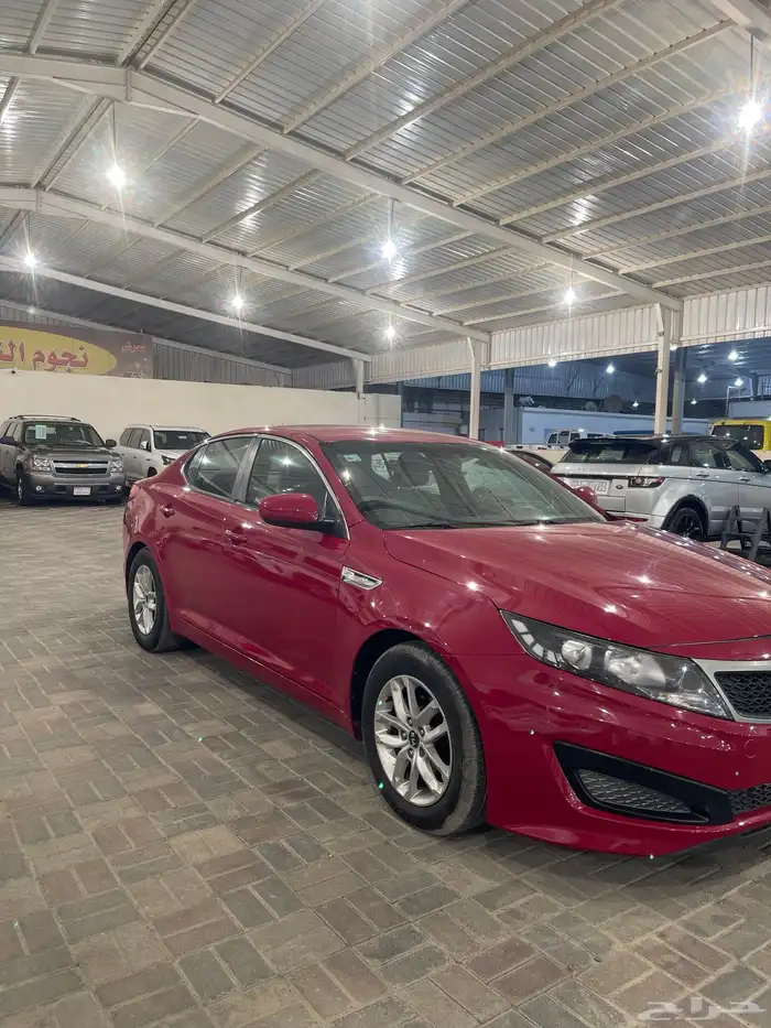 كيا أوبتيما موديل 2013 نص فل احمر دم غزال 12