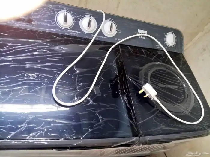 غسالة 13كيلو في كرتونها جديده نفس الي في الصورة 0