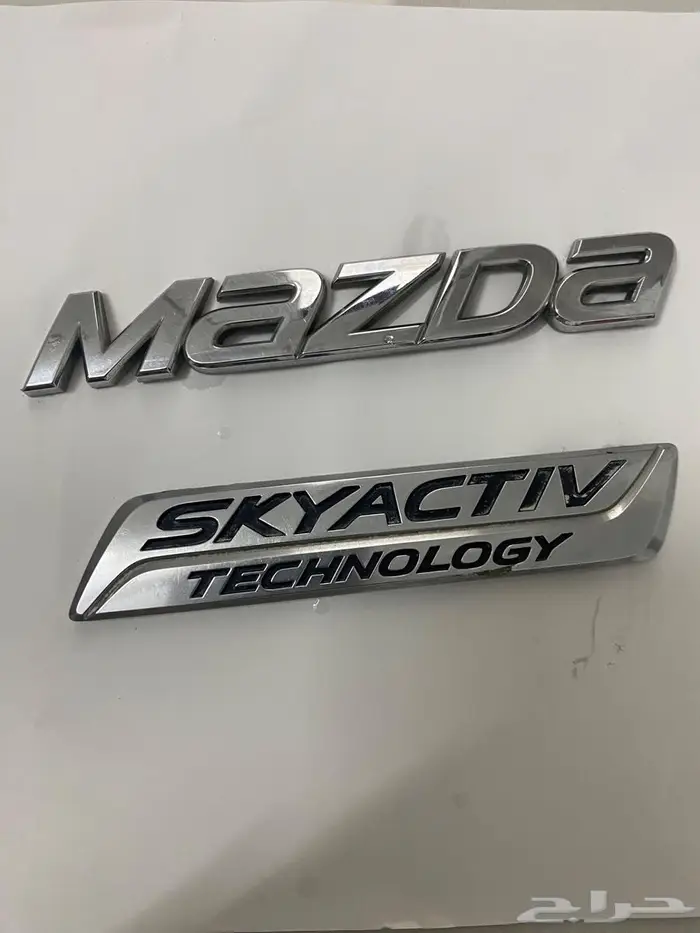 علامات شنطة وكرسي مكينة وكتيب الوكالة مازدا 6 3
