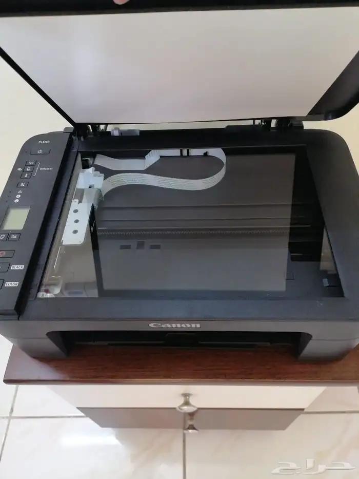 طابعة والة تصوير كانون جديدة مع الورق A4 للبيع 1