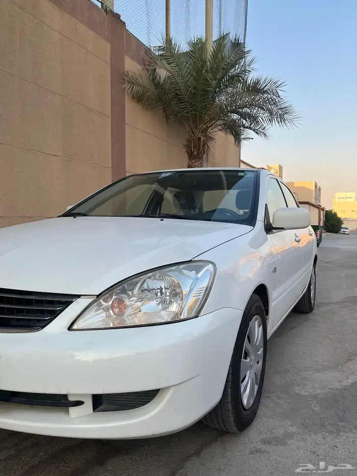 مستوبيشي لانسر 2014 قير اتوماتيك مخزنة 8