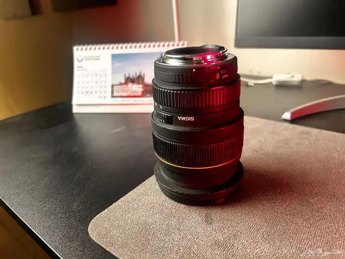 عدسة سيجما ( كانون) 0