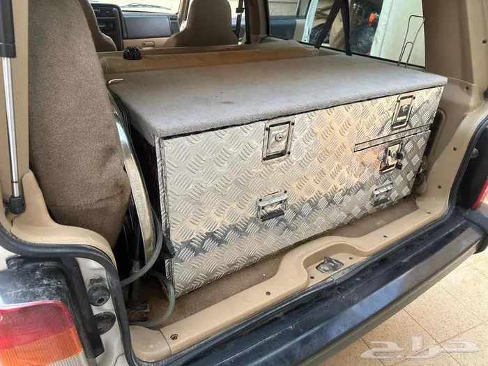 أدراج عزبه خشب تلبيس واجهة ألمنيوم راكب على شيروكي 2001 1