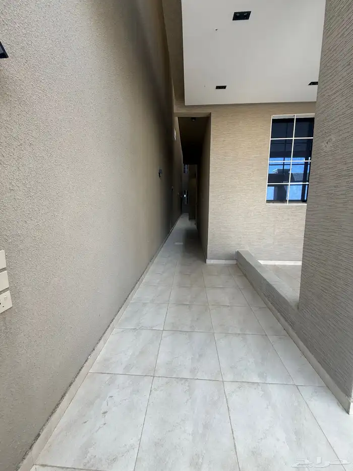 للبيع أرضي بحوش وشقق علويه بسطح خاص التحليه خميس مشيط 6