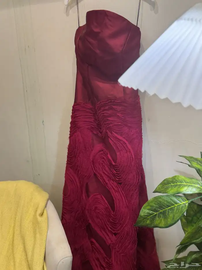 فستان من المصممة اسبار 0