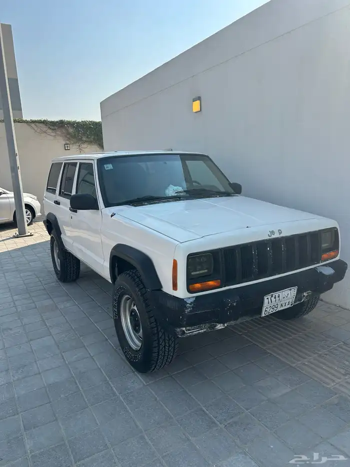 جيب شيروكي ابيض موديل 99 قير عادي 0