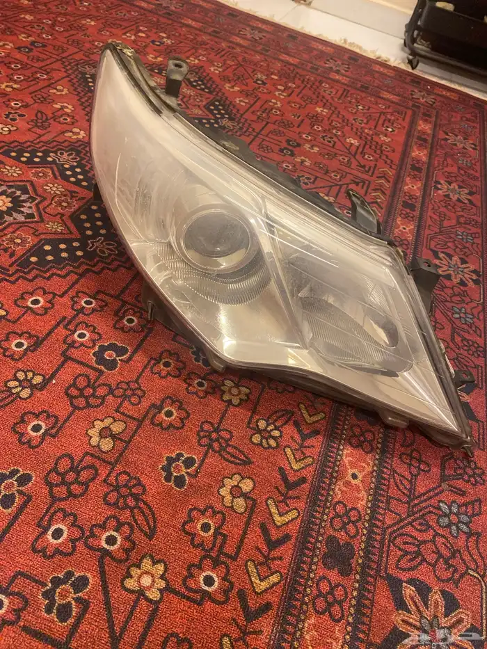 شمعة كامري يمين 2014جديد ناقص غطا بس 0