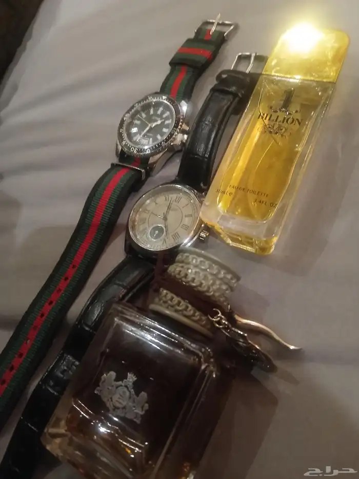 ساعتين قوتشي كلاسيك120 الاثنينX2x100 عطور.فاخرة50 اثنين2x40 6