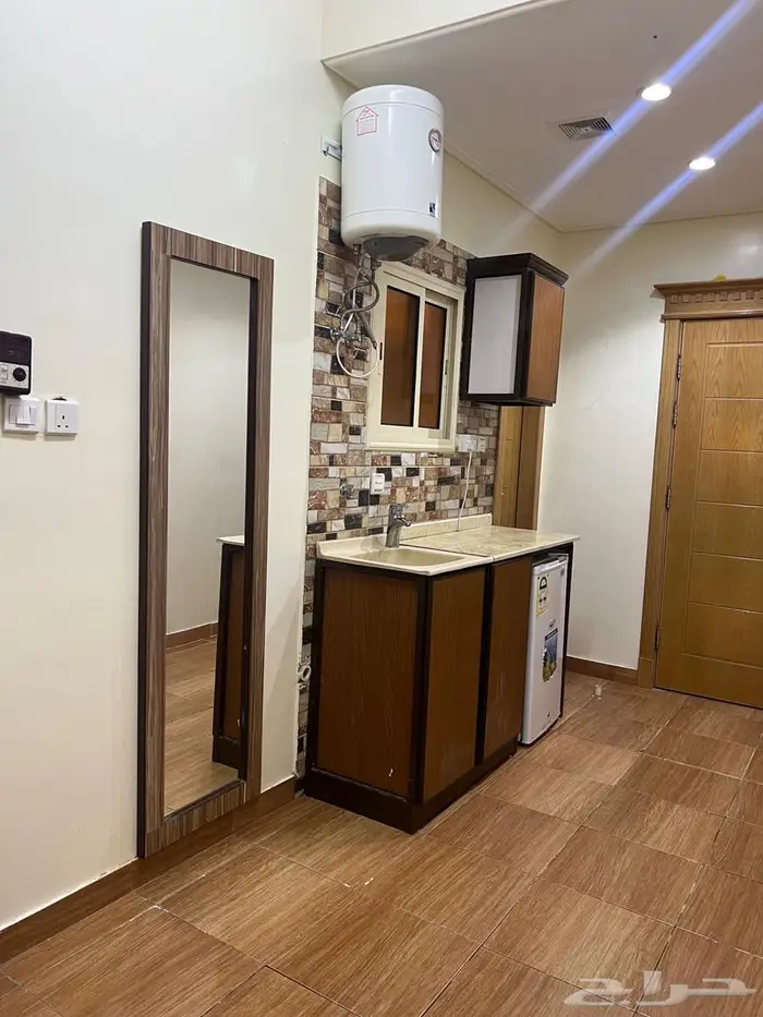 غرفه نوم وصاله وحمام وركن المطبخ 6