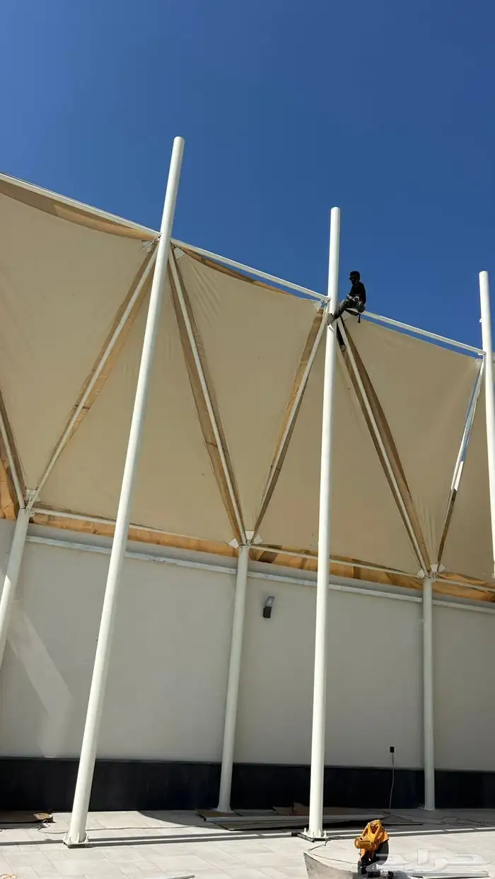 مظلات مثلثات 0