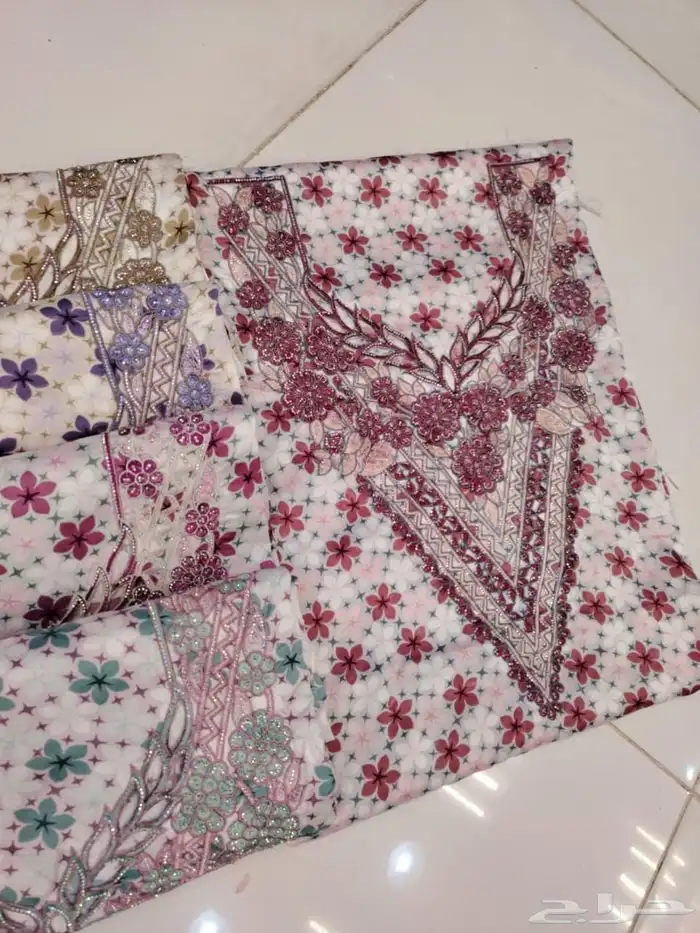 مخاوير قطع غير مخيطة تطريز على الصدر والاكمام 0