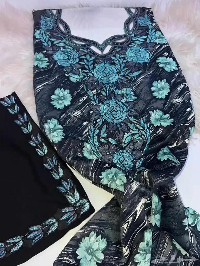 مخاوير قطع غير مخيطة تطريز على الصدر والاكمام 1