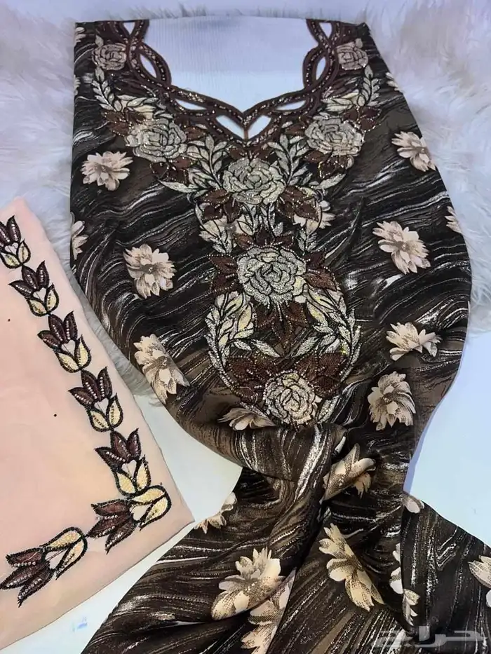 مخاوير قطع غير مخيطة تطريز على الصدر والاكمام 3