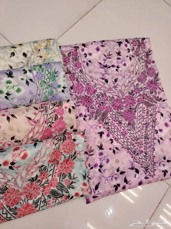 مخاوير قطع غير مخيطة تطريز على الصدر والاكمام 2