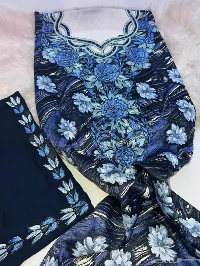 مخاوير قطع غير مخيطة تطريز على الصدر والاكمام 4