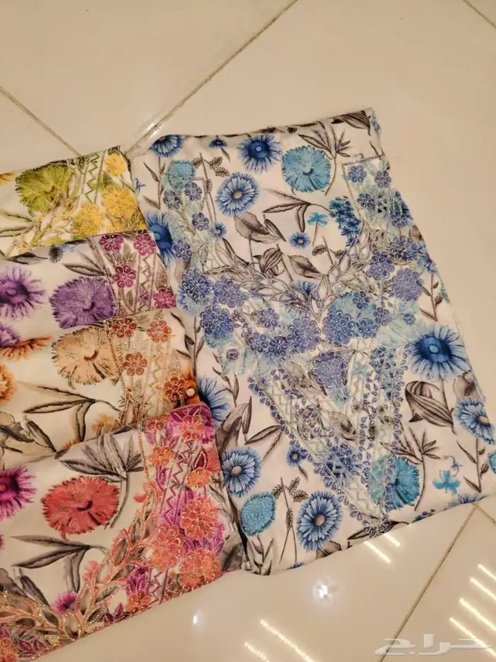 مخاوير قطع غير مخيطة تطريز على الصدر والاكمام 3