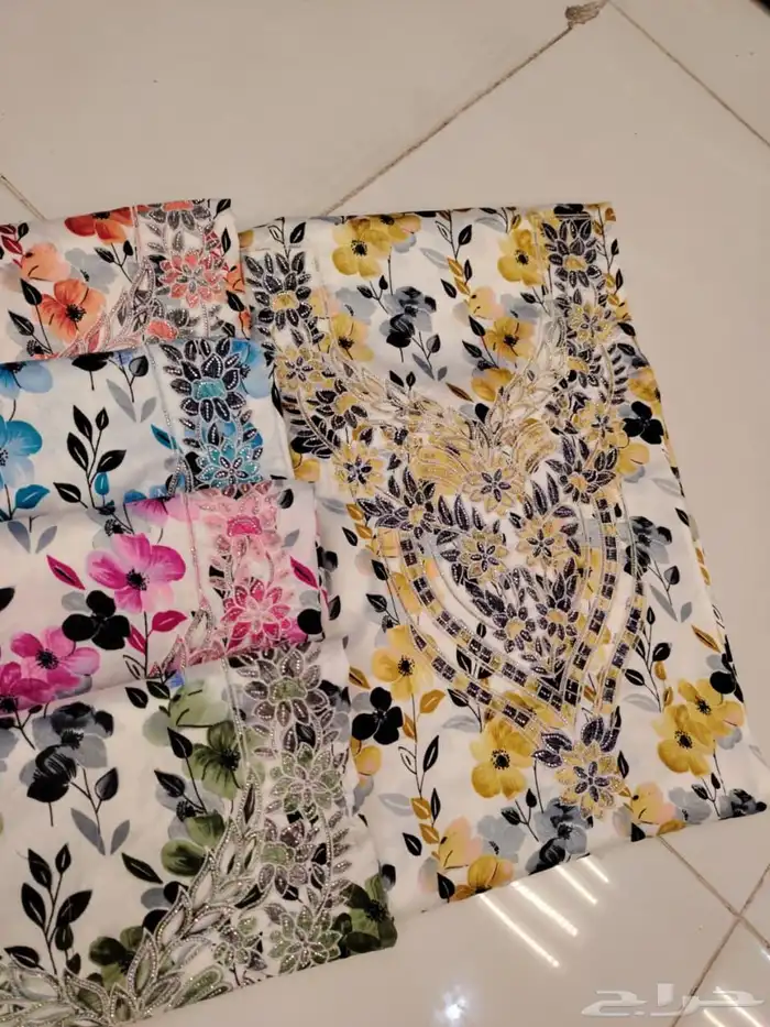 مخاوير قطع غير مخيطة تطريز على الصدر والاكمام 4