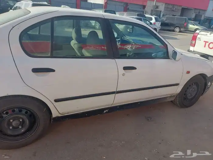 نيسان بريميرا موديل 2001 لون ابيض فحص دوري ساري بدون اللوحه 7