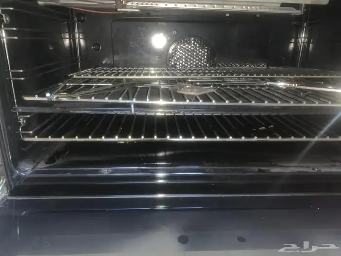 فرن غاز ايطالي 5عيون وفرن تحت امان كامل واشعال ذاتي ومروحة 7