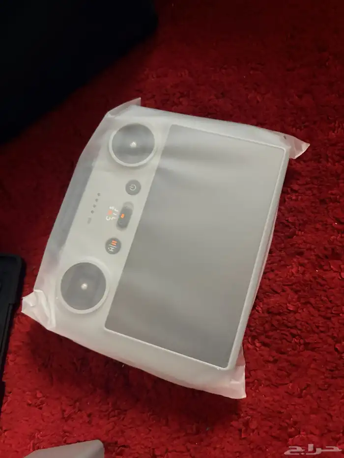 رموت dji وبطاريه عدد 2 للمافيك مني 5 برو وفلاتر 1