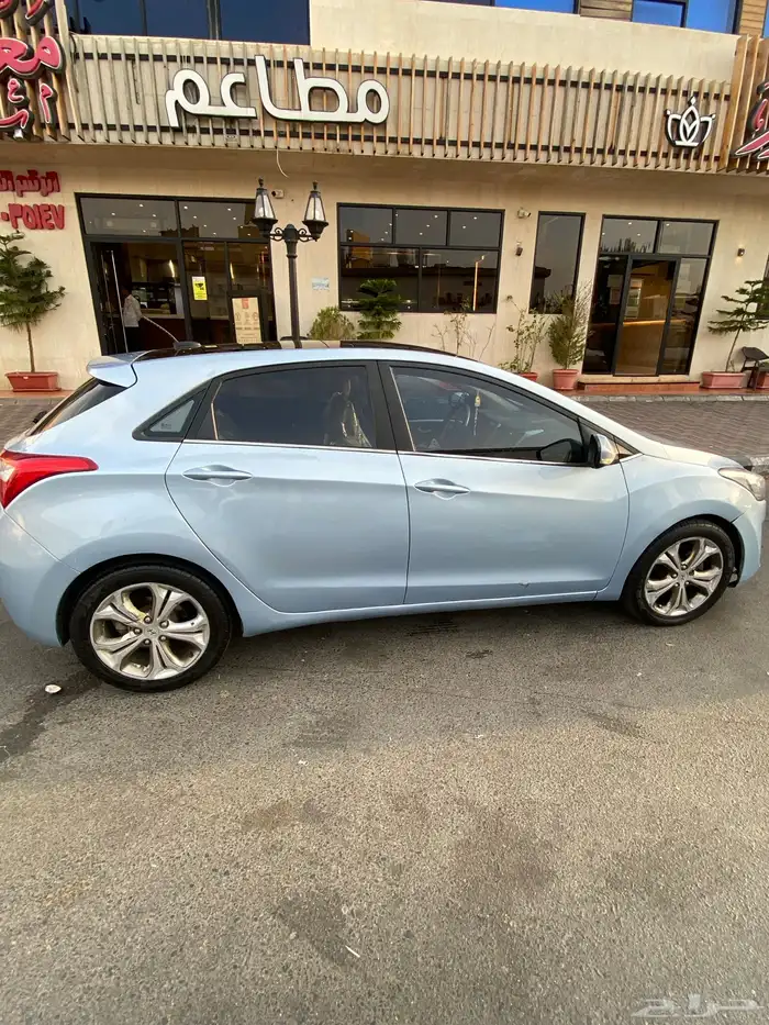 سياره اي ثري سيدان 2013 2