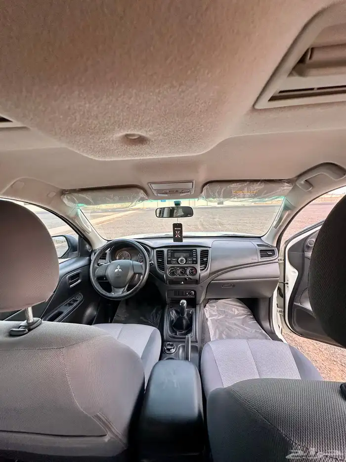 ميتسوبيشي L200 ديزل قير عادي ممشى 169 الف 13