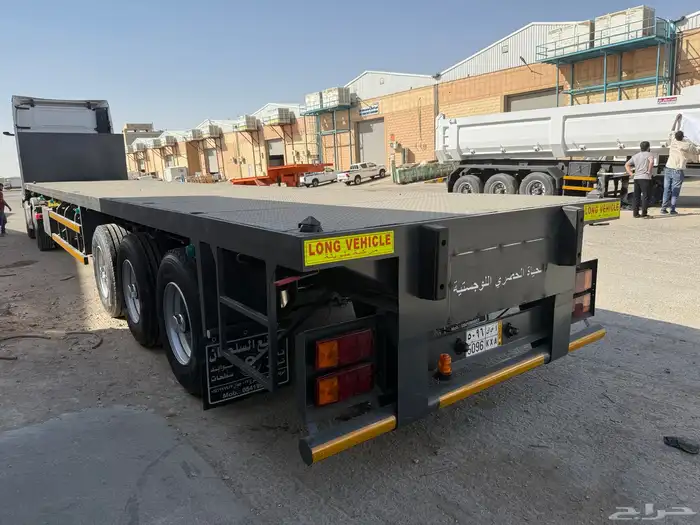 سطحة 3 محاور وناقلات كونتينر 12