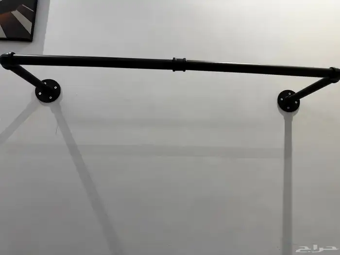 علاقه ملابس جداريه سوداء 0