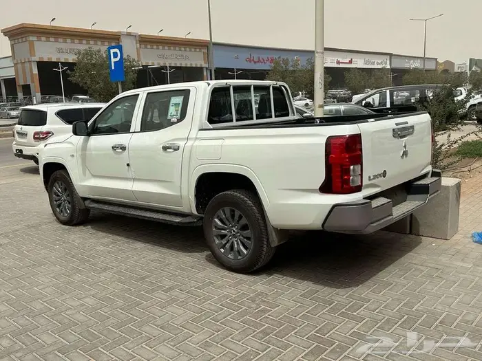 عرض خاص ميتسوبيشي L200 غمارتين دبل نص فل اوتوماتيك 2024 3