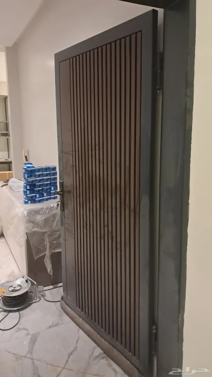 باب حديد بأب ليزر باب كلادينج باب ساده 1