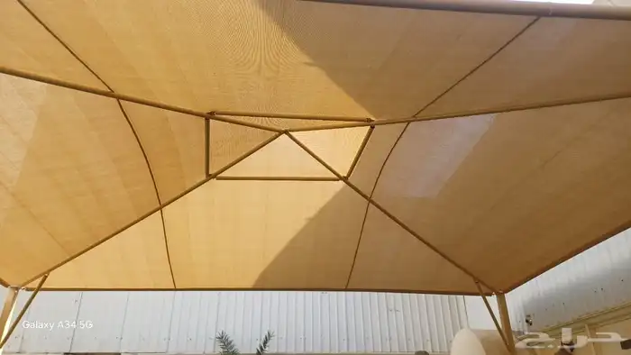 مظلات وسواتر وبيوت الشعر جده وتغيير قماش وفك ونقل 4