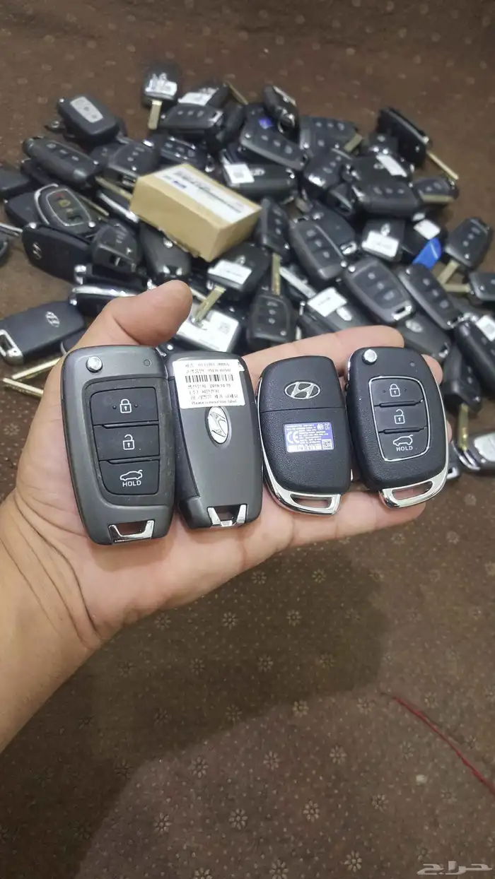 محل مفاتيح الرياض لبرمجه السيارات البصمه والعادي 0