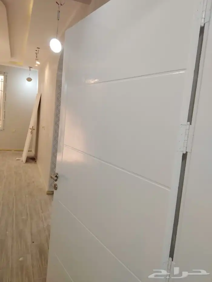 دهان مباني داخليه خارجية وجميع انواع الابواب 20