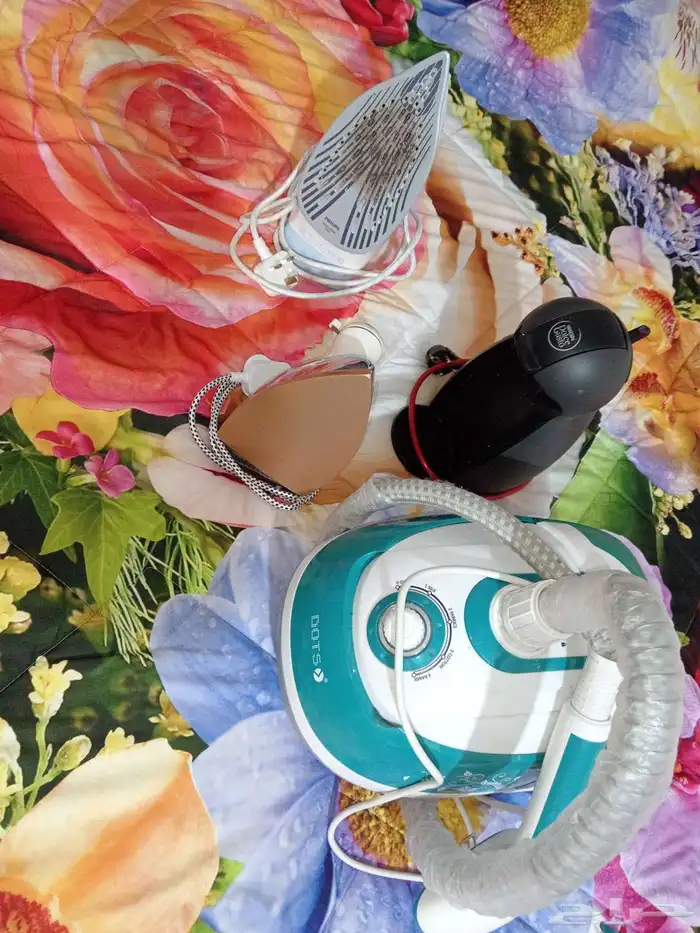 مكواة كهربائية ومكوات بخار. مكوات و لتحضير القهوة 0