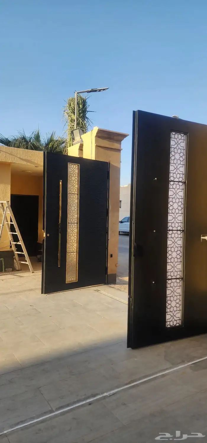 دهان ابواب حديد وخشب نراي وزيتي 2