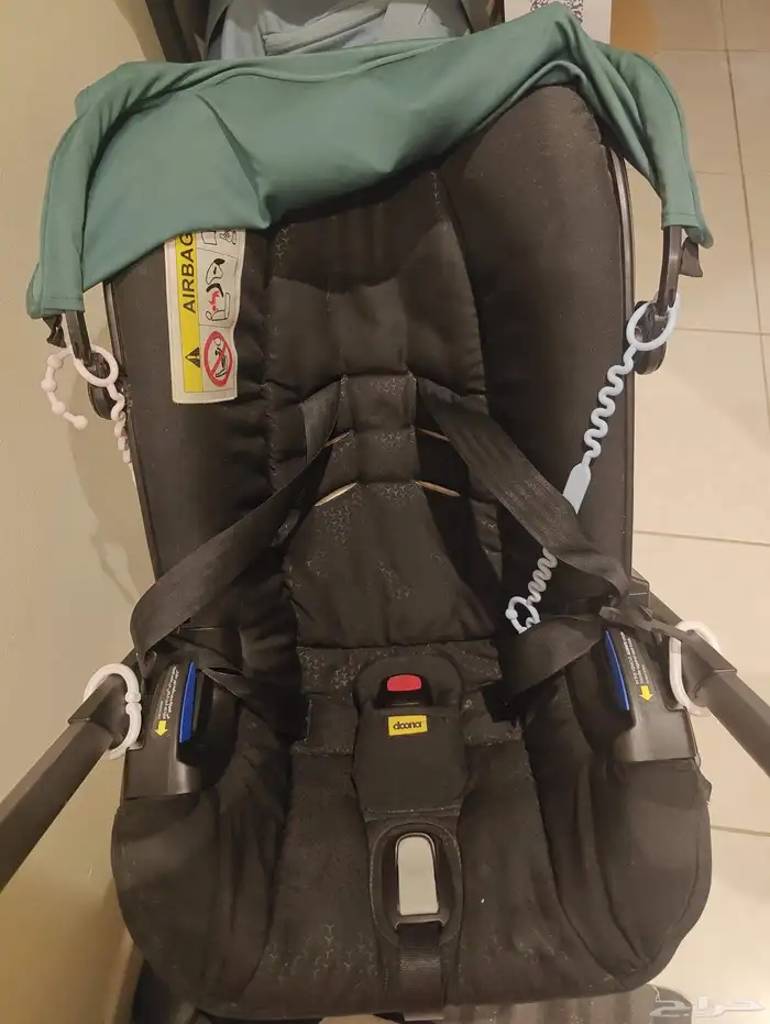عربة أطفال و كرسي سيارة 2 في 1 doona أصلية من mumzworld 0