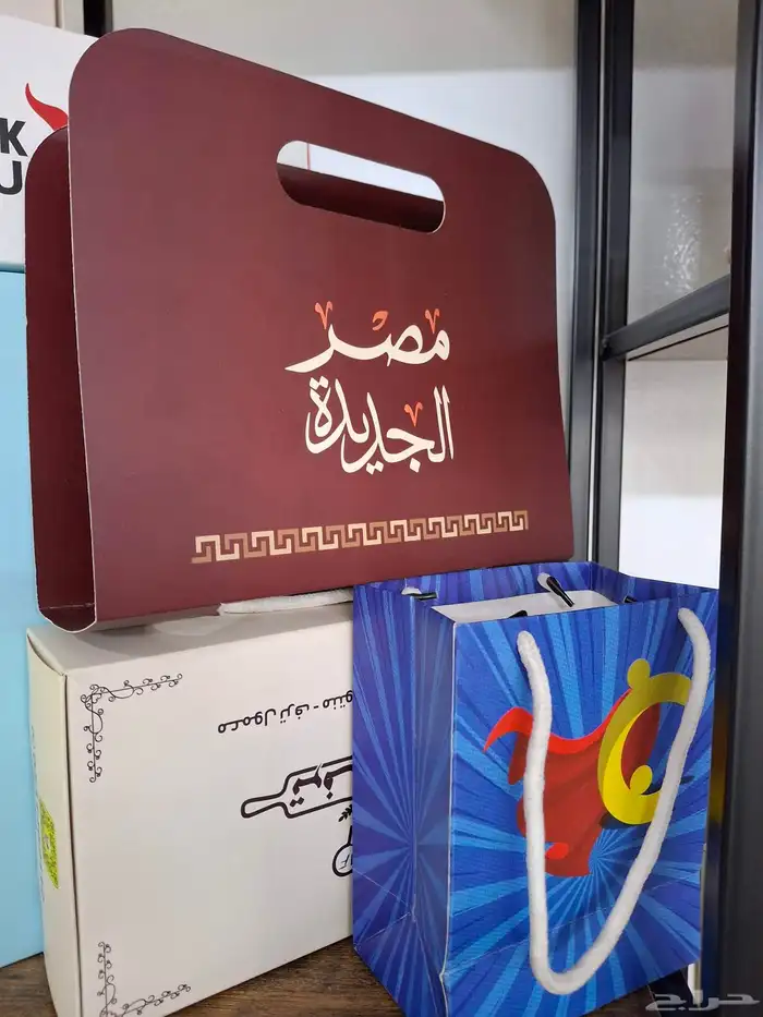 طباعة أكياس ملصقات بنر ختم كوب بوكسات ورق زبدة بكج عبايات 6
