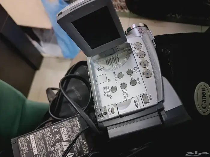 كامرا كانون قديمه تحتاج صيانه وتلفون لاسلكي بانسونك يعمل 3