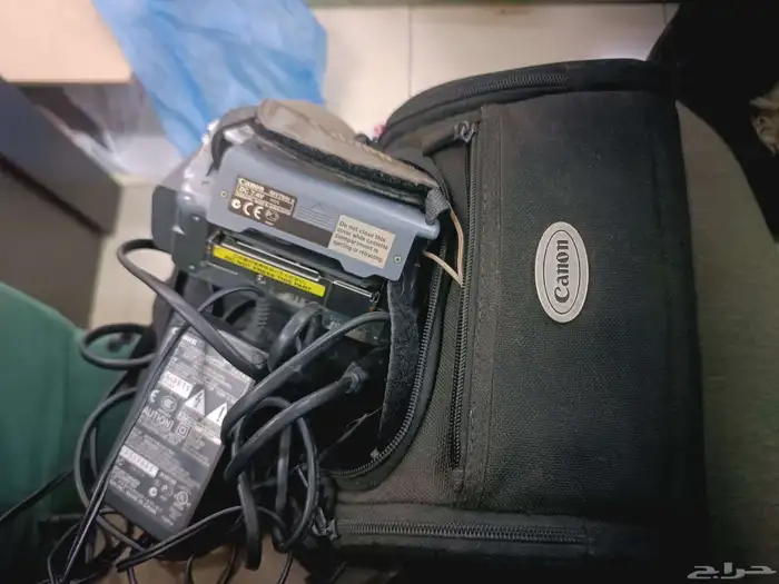 كامرا كانون قديمه تحتاج صيانه وتلفون لاسلكي بانسونك يعمل 1