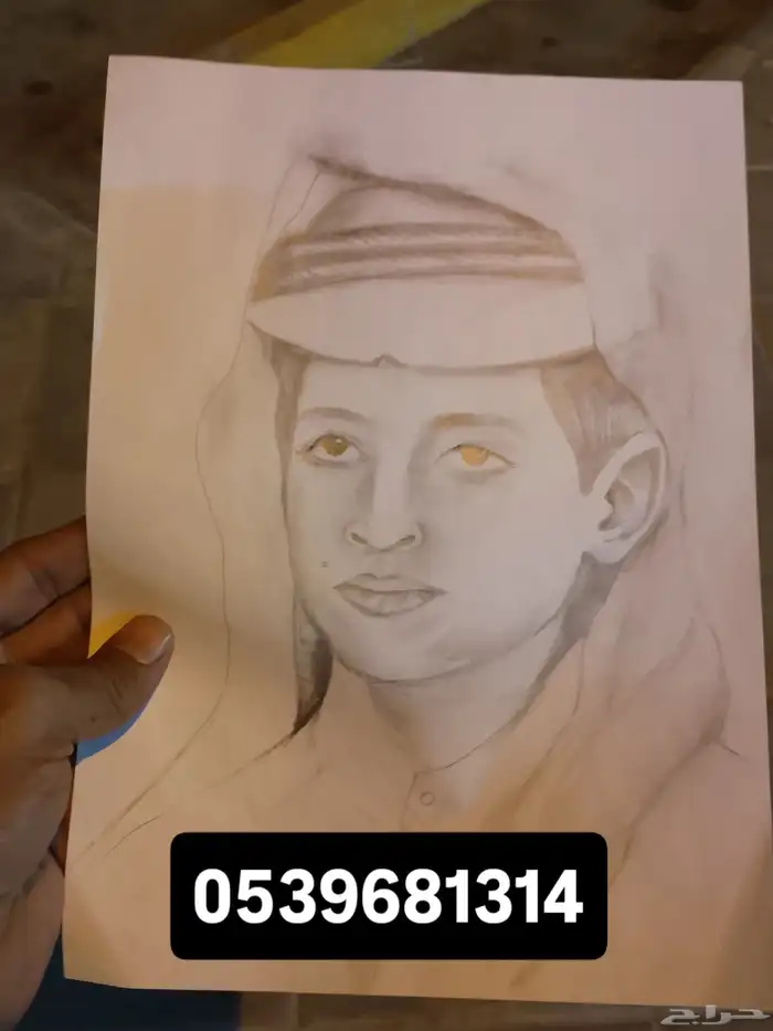 خطاط ورسام بالجدار حروف بارزه 8