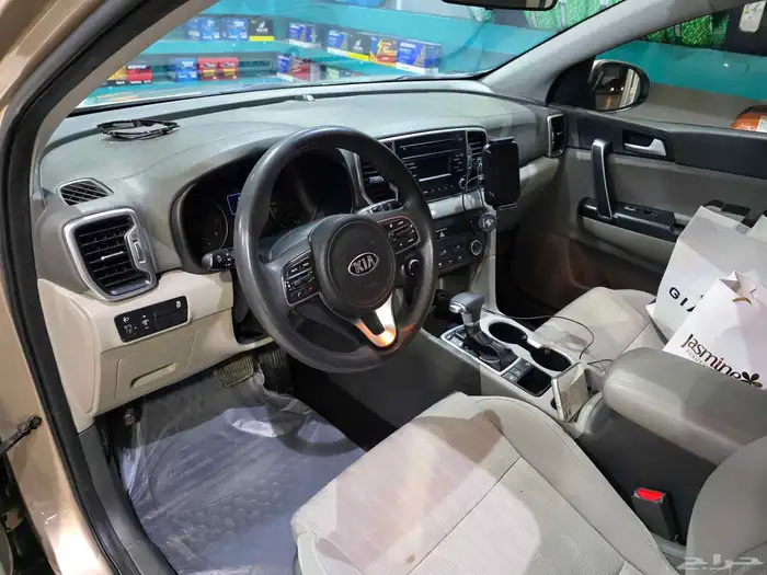 كيا سبورتاج موديل 2018 بحاله ممتازه ماشيه 80 الف كيلو ا 10