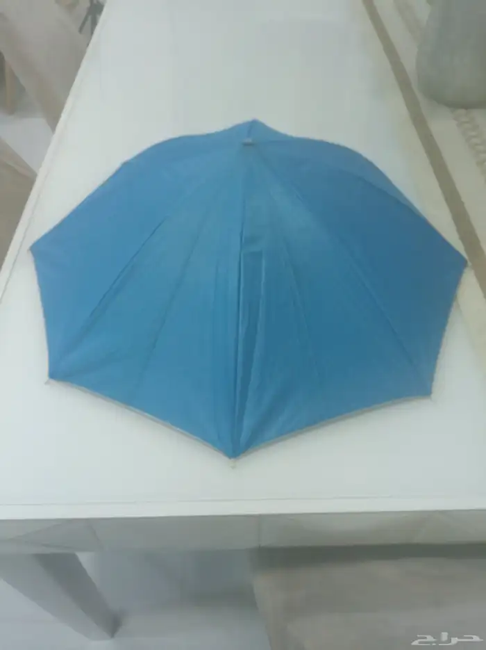 مظلة قابل للبس 0