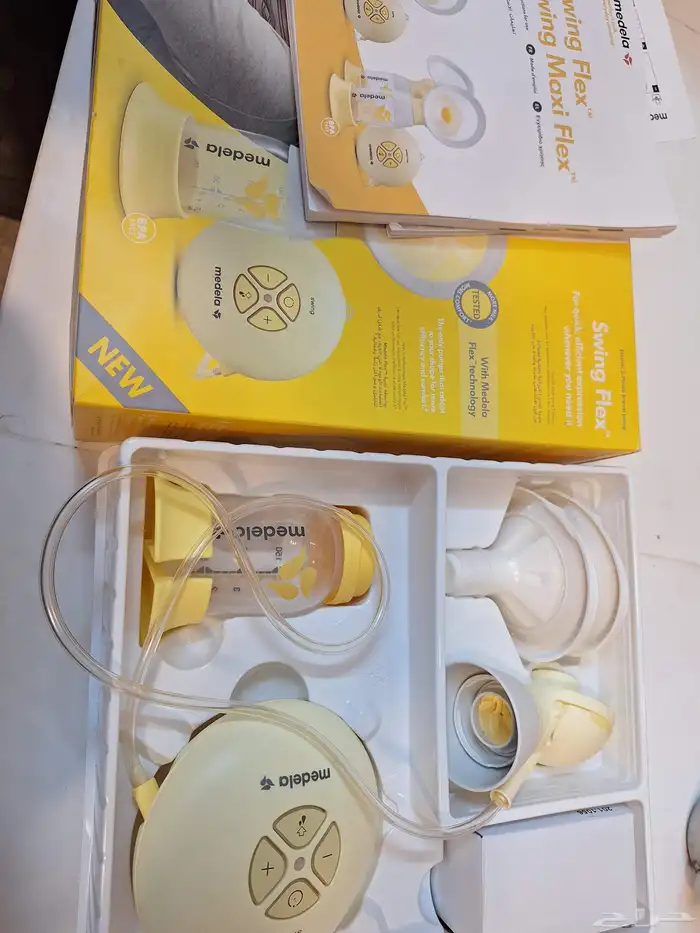 شفاط حليب من ميديلا يشتغل كهربا وبطارية شبه جديد استخدام مرة 0