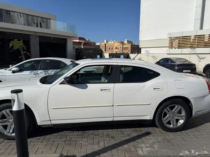 دوج تشارجر 2007 أبيض SXT 6 سلندر 1