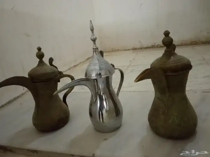 دله بغدادي رسلان تراثيه نحاس وواحد فضي 0