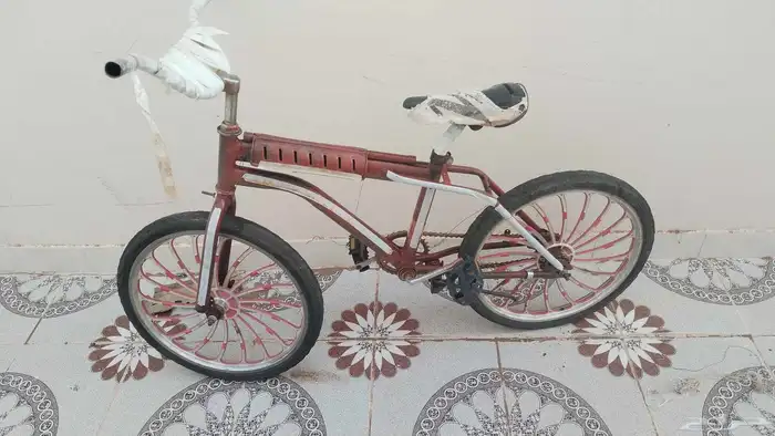 سيكل للبيع مرشوش عنابي 0