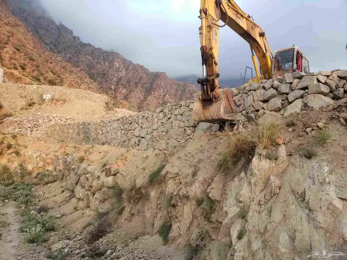 بوكلين لبنيان الحجر وقص الاراضي 2