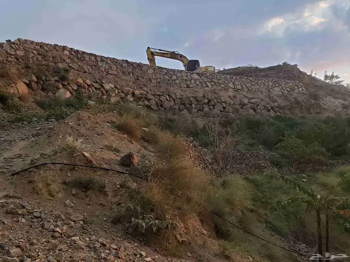 بوكلين لبنيان الحجر وقص الاراضي 7